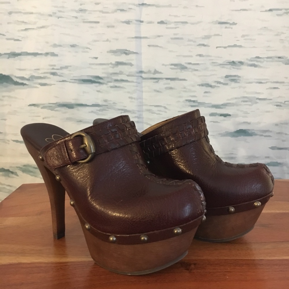 Jessica Simpson brown leather platform clogs.